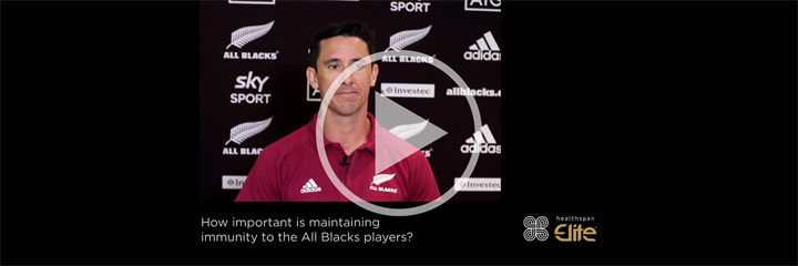 Screenshot of All Blacks Doctor, Dr James McGarvey from video with a play button overlayed
