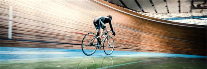 Photo of cyclist in a velodrome