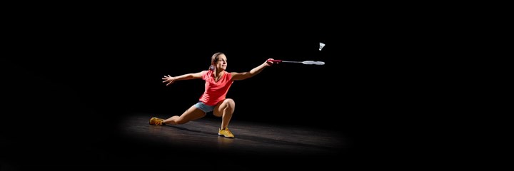Woman playing badminton